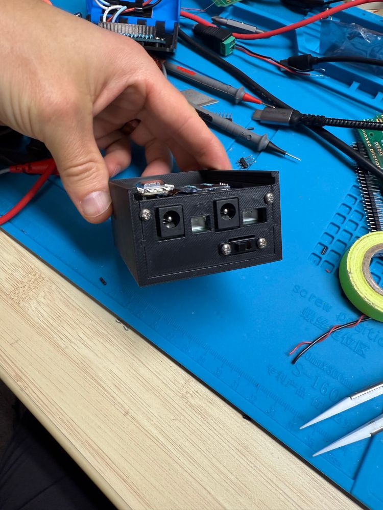 Side view, with connectors through the panel.