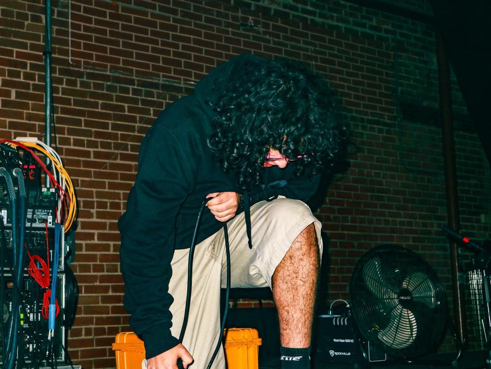 Me standing like iron man on stage