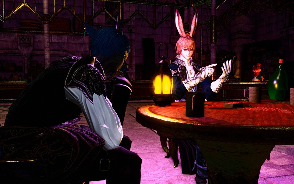 j'ce and loifa at a table in the hard place. this is shot from over j'ce's shoulder.
