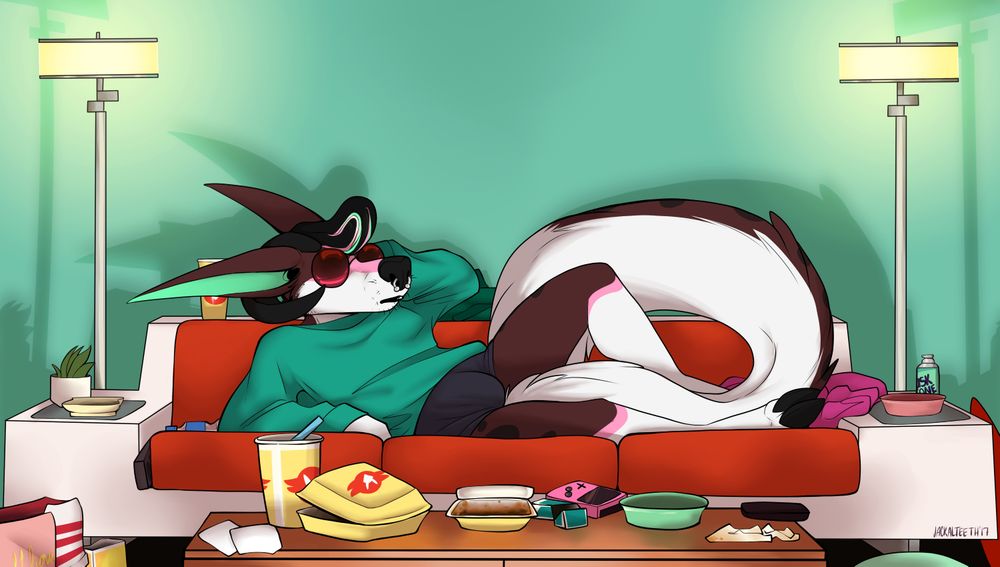 A Neapolitan colored hellhound with ram horns and a pompador, reclined on a midcentury style couch. He's wearing large round glasses with pink lenses, an oversized green sweatshirt and shorts. All around him is fast food garbage and miscellaneous hobby items.