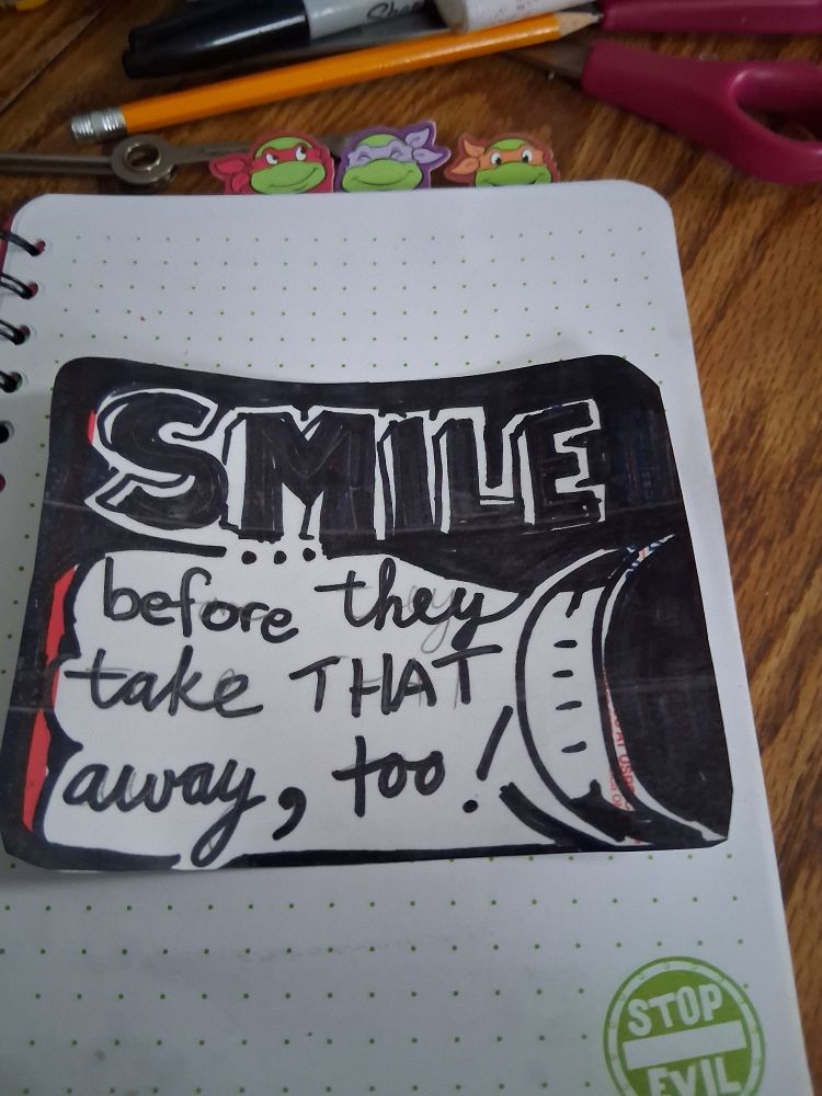 Text on a sticker reads SMILE BEFORE THEY TAKE THAT AWAY TOO with a vertically placed smile at right