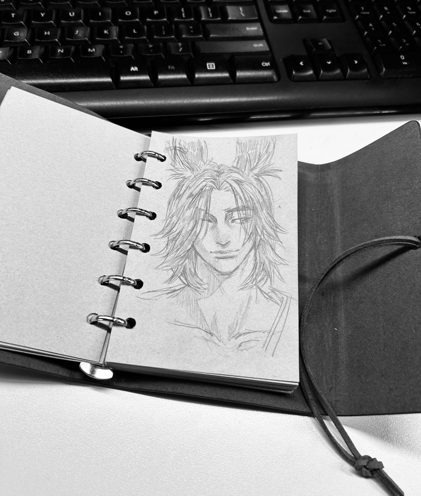 doodle of jackie (my viera wol) in the smallest sketchbook known to man 