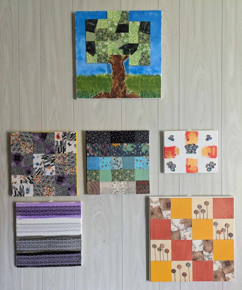 Overall Composition:

    Arrangement: The artworks are arranged in a slightly irregular grid, creating a visually interesting display.
    Style: The artworks vary in style, from abstract to representational, and in medium, from painting to fabric art.
    Color Palette: The overall color palette is diverse, with a range of colors used in the different artworks.
    Framing: Each artwork appears to be framed or mounted on a canvas or board.