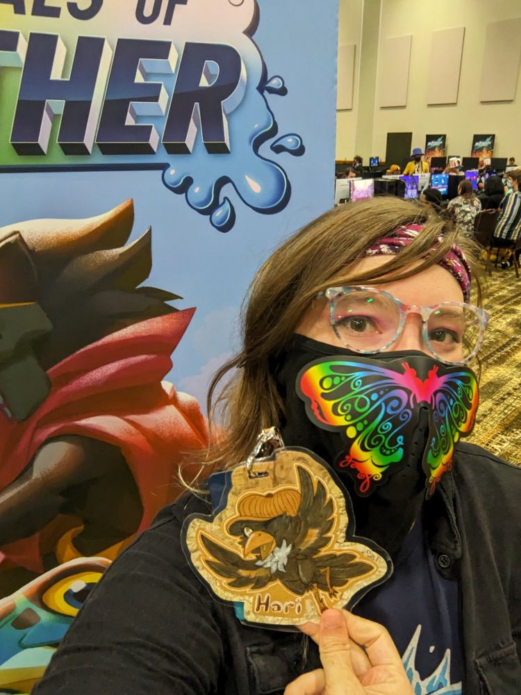 Selfie with a promotional standee for Rivals of Aether.