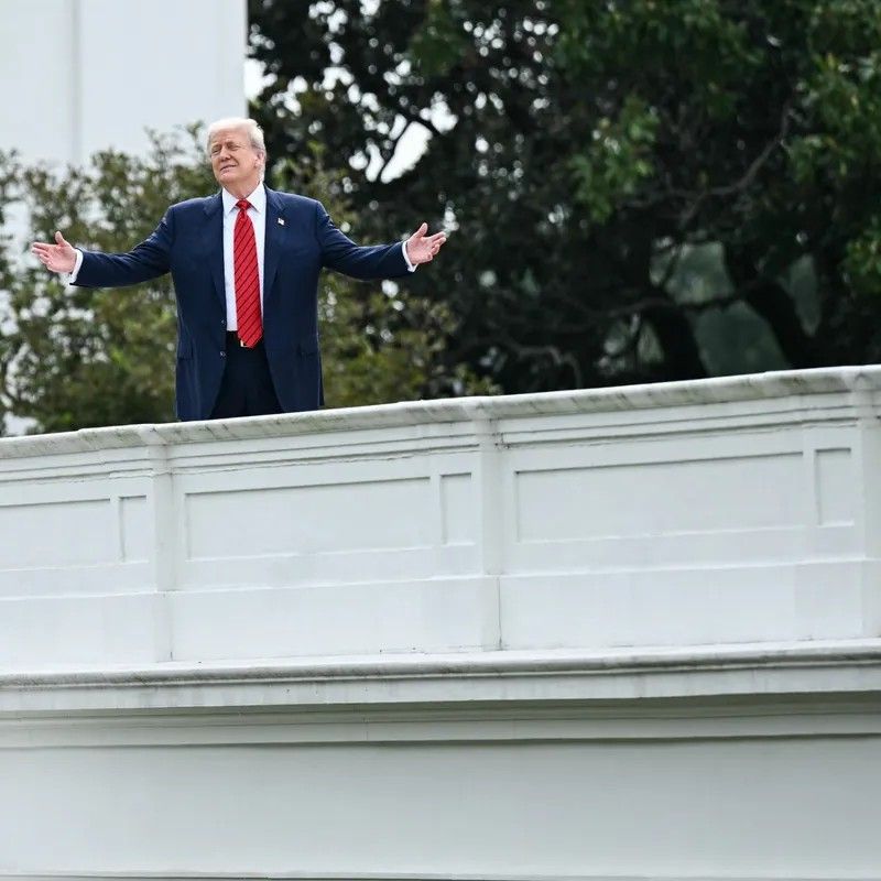 #MangoMussolini standing on the roof of the Whitehouse with arms outstretched.