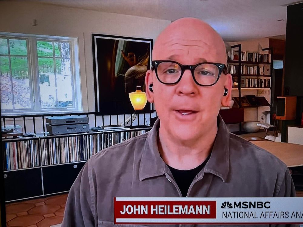 John Heilemann on MSNBC with this stereo and record collection in the background.