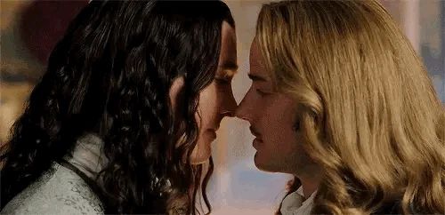 Phillipe and Chevalier from Versailles kissing.  