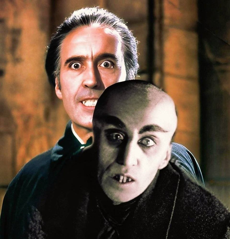 A Photoshopped image of Count Dracula & Count Orlok in a similar, "cuddling" position.