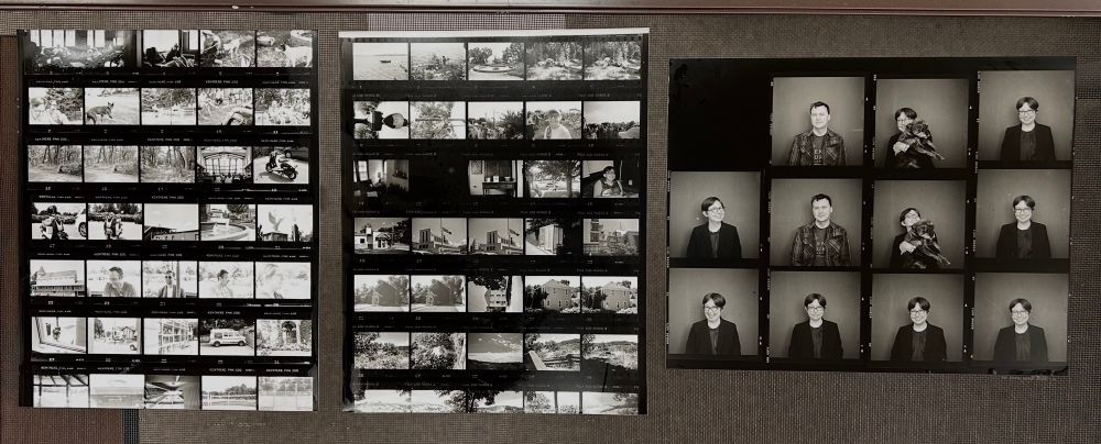 3 photographic contact sheets. A page of negatives are laid out directly on top of a sheet of photo paper and then exposed. This yields thumbnail images (actual size of negatives) on a full 8x10 page. About 35 images are made for a roll of 35mm film. On the right is a contact sheet of medium format (6cm square) negatives.