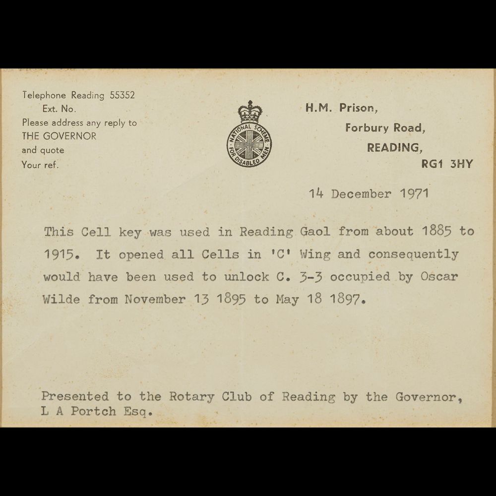 A museum caption, explaining what the key was for- the cell key for Reading Gaol from 1885-1915 (i.e. it would have been used to lock Oscar Wilde's cell during his imprisonment there 1895-1897)