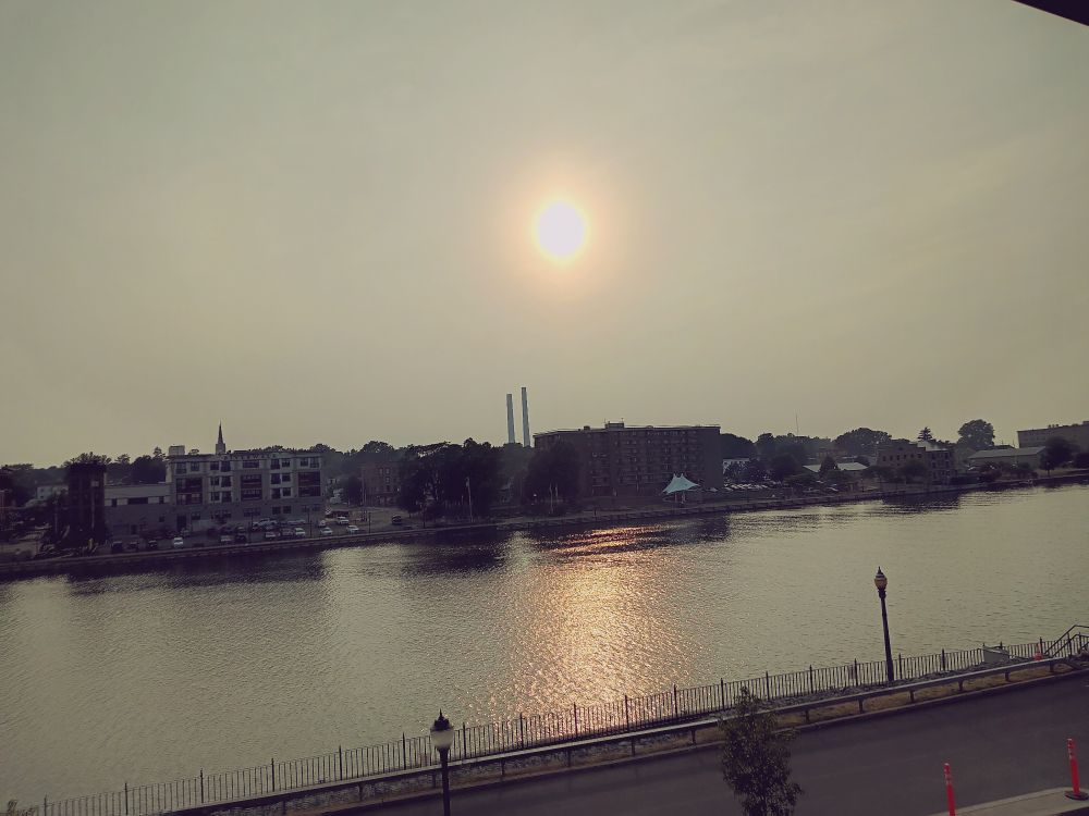 Sunset setting over the Oswego River