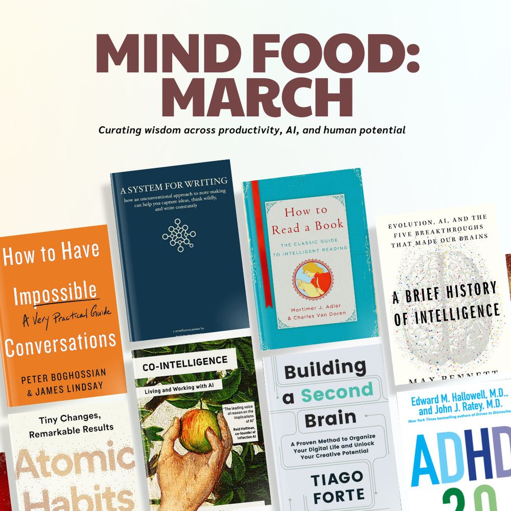 A collection of eight books arranged in a reading list for March titled "MIND FOOD." The books are: "Atomic Habits" by James Clear (about building tiny habits with remarkable results), "How to Read a Book" by Mortimer J. Adler (on extracting maximum value from texts), "Building a Second Brain" by Tiago Forte (about organizing digital information), "A System for Writing" by Bob Doto (on making writing consistent), "ADHD 2.0" by Edward Hallowell (strategies for transforming ADHD into a strength), "A Brief History of Intelligence" by Max Bennett (on evolution of intelligence), "Co-Intelligence" by Ethan Mollick (framework for collaborating with AI), and "How to Have Impossible Conversations" by Peter Boghossian (techniques for productive dialogue across disagreements). The image represents the poster's current reading during their job search, focusing on personal development, productivity, and AI topics.