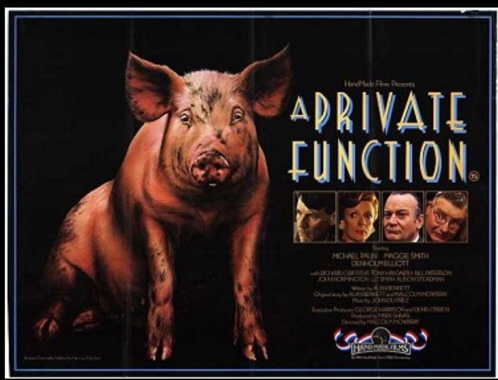 Film poster for A Private Function, a lovely war time farce you should definitely watch. It concerns a black market pig which is prominent on the poster. 