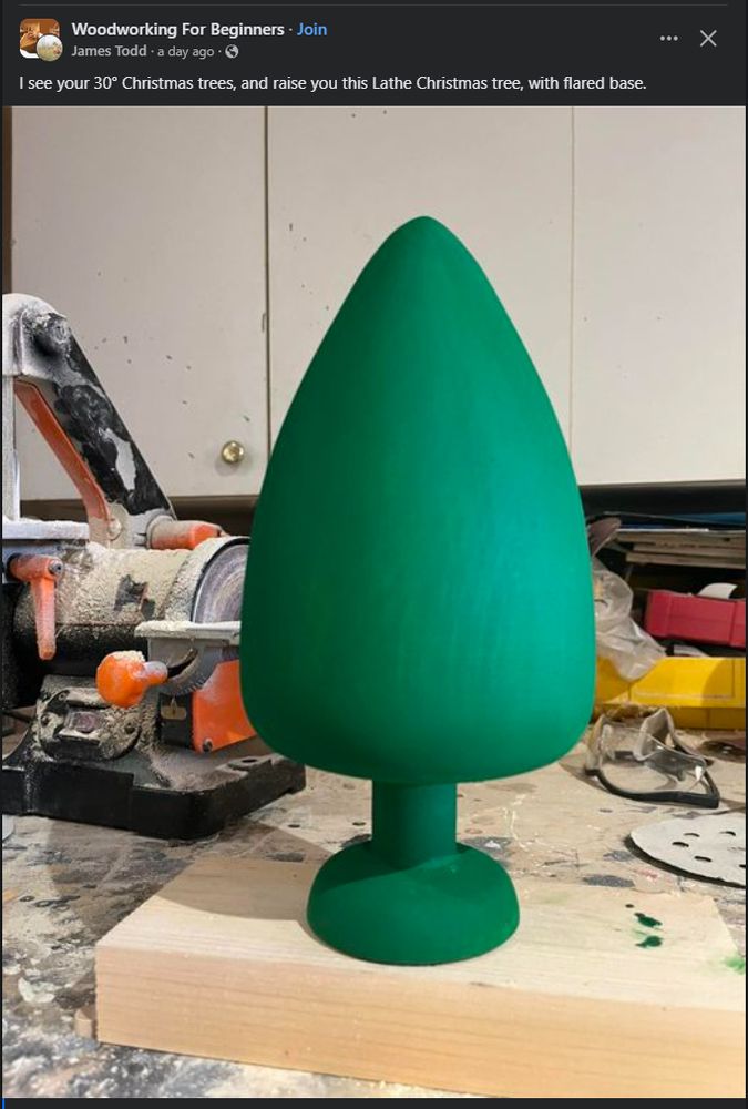 30 inch wooden approximation of a Christmas tree but it looks like a giant sex toy. A butt plug to be specific. I don't know if they're called that at the sex store but that's the colloquial name at least.  This thing is massive for a sex toy but small for a Christmas tree.  Not sure the target audience.