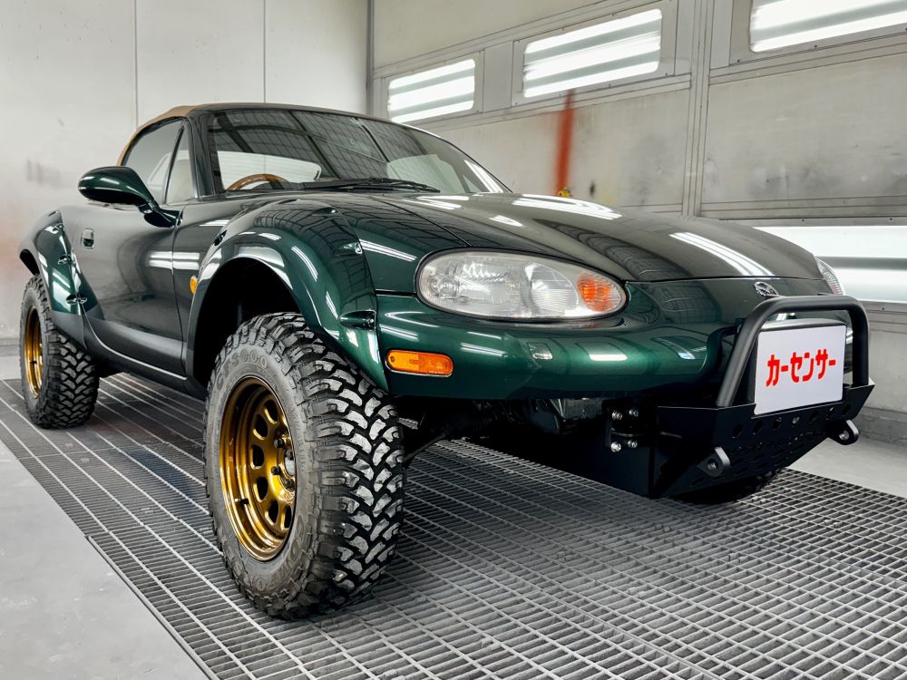1999 Mazda Miata (lifted to the moon)
