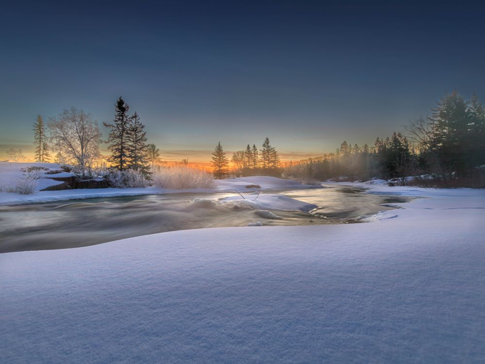 It also turned out to be an amazing sunrise at this location, and I managed to capture this beautiful water, flowing down and a cold and icy temperatures #Icy_river #sunrise #snow #fog #winter 

Get your favourite image printed from me by going to https://rudidueck.com/store  or contacting me at: Photographer@RudiDueck.com

You can also get pictures printed and framed from me as well and also do Canvas.

All of my Pictures have been taken with a Canon 5D Mark IV. Lenses Canon 100-400mm Canon 24-105mm Sigma14mm F1.8
Follow Me on Twitter or Vero @RudiDueck 
Subscribe to our YouTube channel, @NomadOutdoorAdventures 
Website: https://linktr.ee/nomadoutdooradventures
#PhotographerRudiDueck
#DigitalArt 
#ExploreMB
@ExploreMB
#travelmanitoba
#travel_manitoba
@travelmanitoba
#BirdPhotography
#NightPhotograhy
#Stars
#Astrophotography
#Astronomy
#GM
#raw_GM
#GM_Lovers
#Snap_Member 
All Images/Video Rights Belong to @PhotographerRudiDueck
	1.	#NaturePhotography 
	2.	#LandscapePhotography 
	3.	#WildlifePhotography 
	4.	#ScenicViews 
	5.	#OutdoorAdventure  
	6.	#NaturalBeauty 
	7.	#ExploreNature 
	8.	#CaptureTheWild 
	9.	#EarthPix 
	10.	#Wilderness 
	11.	#FlowerPower 
	12.	#SunsetMagic 
	13.	#MountainScapes 
	14.	#Waterfalls 
	15.	#BirdsOfParadise 
	16.	#ForestLife 
	17.	#NatureLovers 
	18.	#MacroWorld 
	19.	#SeasonsChange 
	20.	#HikingAdventures
       21. #NomadPhotographer 
	22. #OutdoorAdventurePhotography 
	23. #NatureExplorer 
	24. #RudiDueckAdventures 
	25. #WildernessPhotography 
	26. #LandscapeNomad 
	27. #PhotographingNature 
	28. #NomadicLife 
	29. #WanderlustPhotographer 
	30. #RudiDueckJourneys
       31. #PhotographerRudiDueck