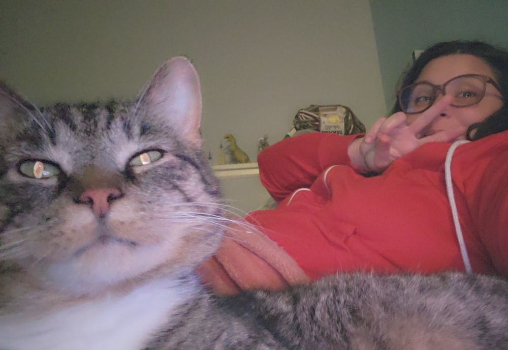 Snuggling on the couch with my collaborator Bertrum.