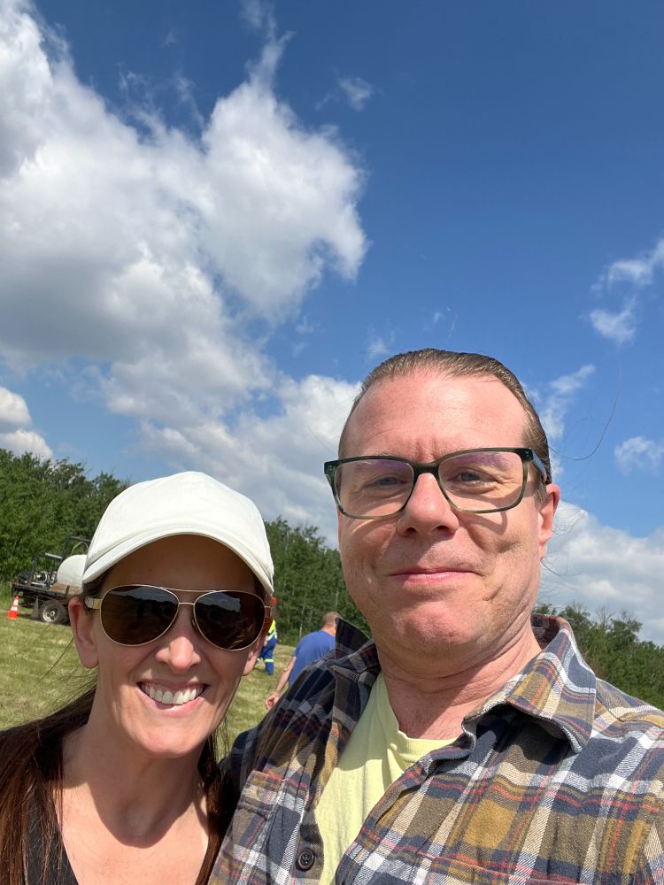 Councillors Ryan Pollard and Laura Tillack standing in a field