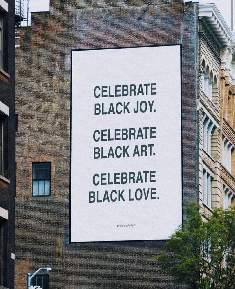 Poster saying "Celebrate Black Joy, Celebrate Black Art, Celebrate black Love" 