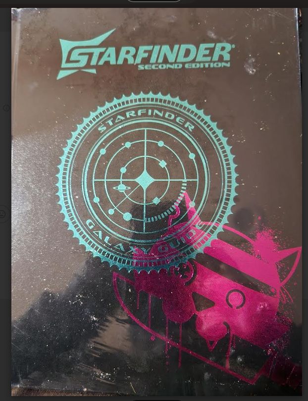 a book bound in leather with the words "Starfinder Second edition, Galaxy Guide" 