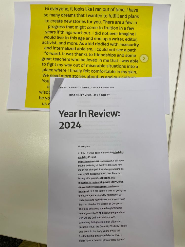 Two pieces of paper on the desk, in the front Alice’s “Year in Review: 2024” and a yellow paper with Alice’s goodbye to the community 