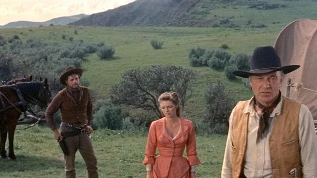 photo of Gary Cooper as The Man of the West (background includes The West, his best gal and a bad guy)