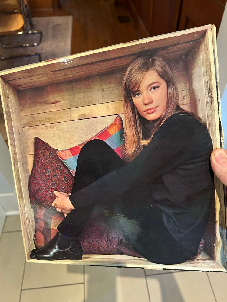 Back cover of the FH2 album, Hardy sitting inside a box?