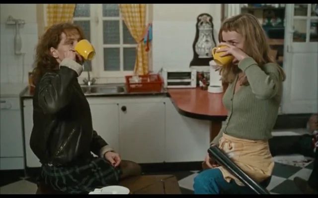 Isabelle Huppert and Sandrine Bonnaire just enjoying a nice cup of coffee in LA CÉRÉMONIE