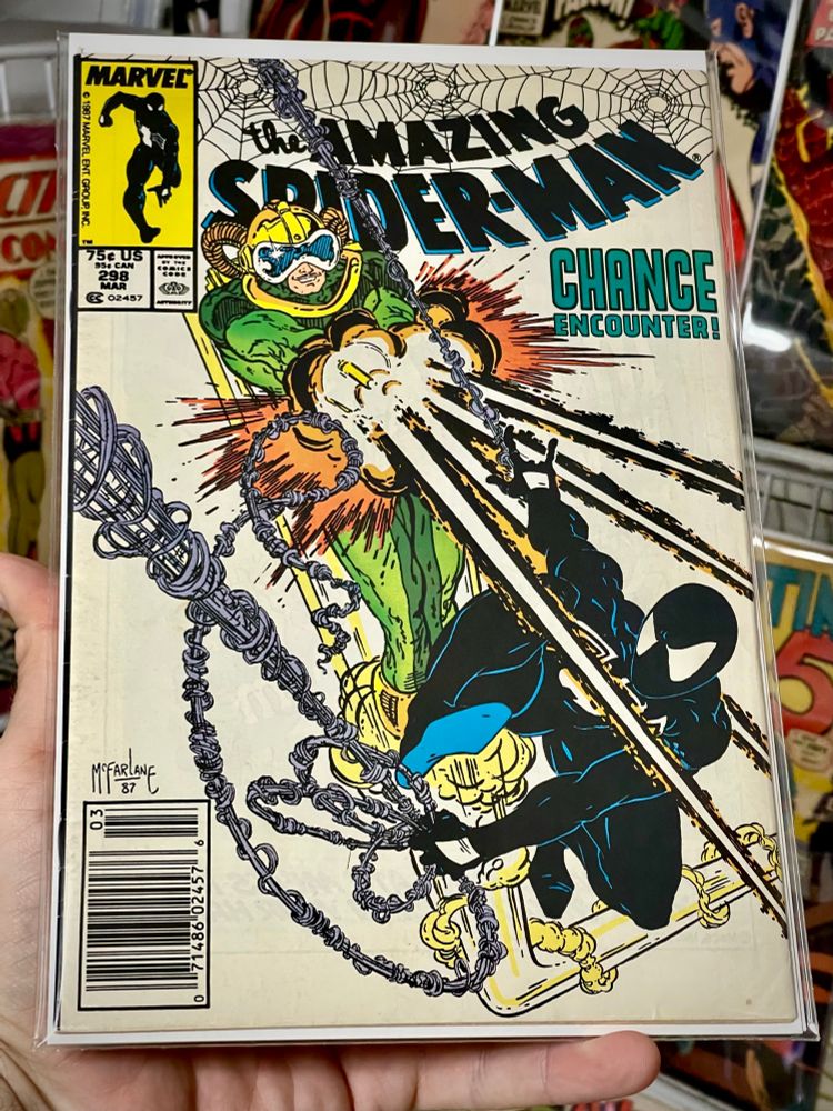 Amazing Spider-man 298b, newsstand variant, 1988 first cameo of Venom, and first Todd McFarlane on ASM, 1st team appearance of The Life Foundation, 1st appearance of Carlton Drake
🔥
Release:	Mar 1988 
🔥
Creators
Writer	David Michelinie
Cover Artist	   Todd McFarlane
Penciller	Todd McFarlane
Inker	Bob McLeod
Colorist	   Janet Jackson
Letterer	   Ken Lopez, Rick Parker
Editor	Jim Salicrup
Editor In Chief	Tom DeFalco