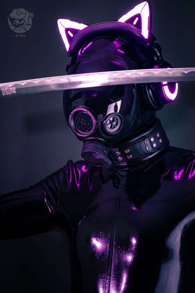 A latex-clad drone entity stands in a dark environment, illuminated by vibrant magenta reflections. The figure wears a glossy black gas mask and cat-ear headphones that emit a neon purple glow, blending softness and menace in equal measure. Its collar is thick, studded, and mechanical-looking, suggesting restraint and control. Raised in front of the figure is a polished sword catching the same neon light, completing a vision that feels both cyberpunk and ritualistic, an artificial being poised for perfect precision and silence.