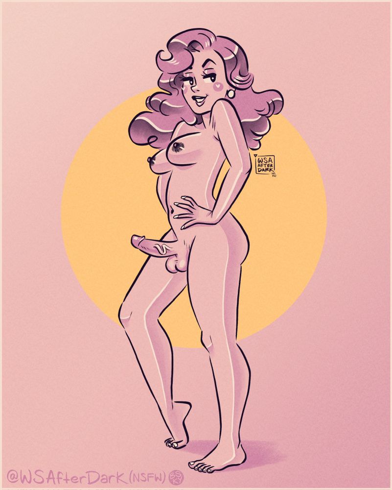 A slim trans woman with big pink hair and perky, pointy breasts stands proudly as her lady penis stands proudly to attention 