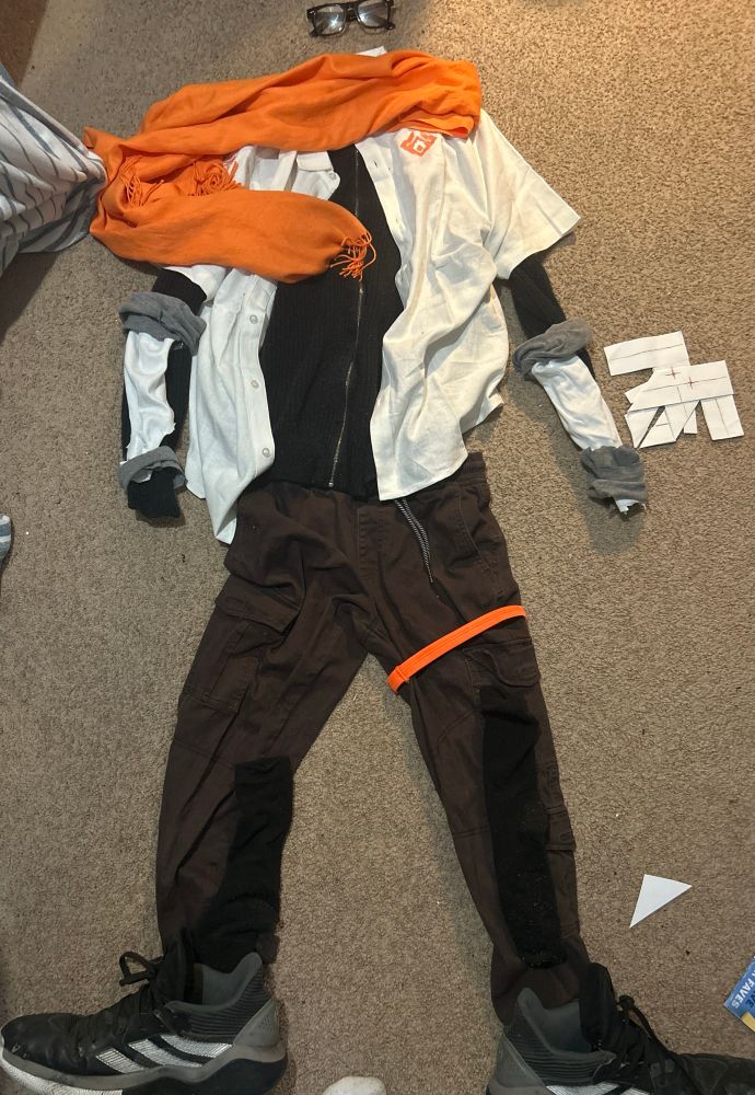 The black undershirt, pants, socks, and shoes I already had at home. The armguards are cut from clothes I outgrew, and a friend helped me fold the Mondo.

Everything else I ordered online, generally searching for the cheapest options.