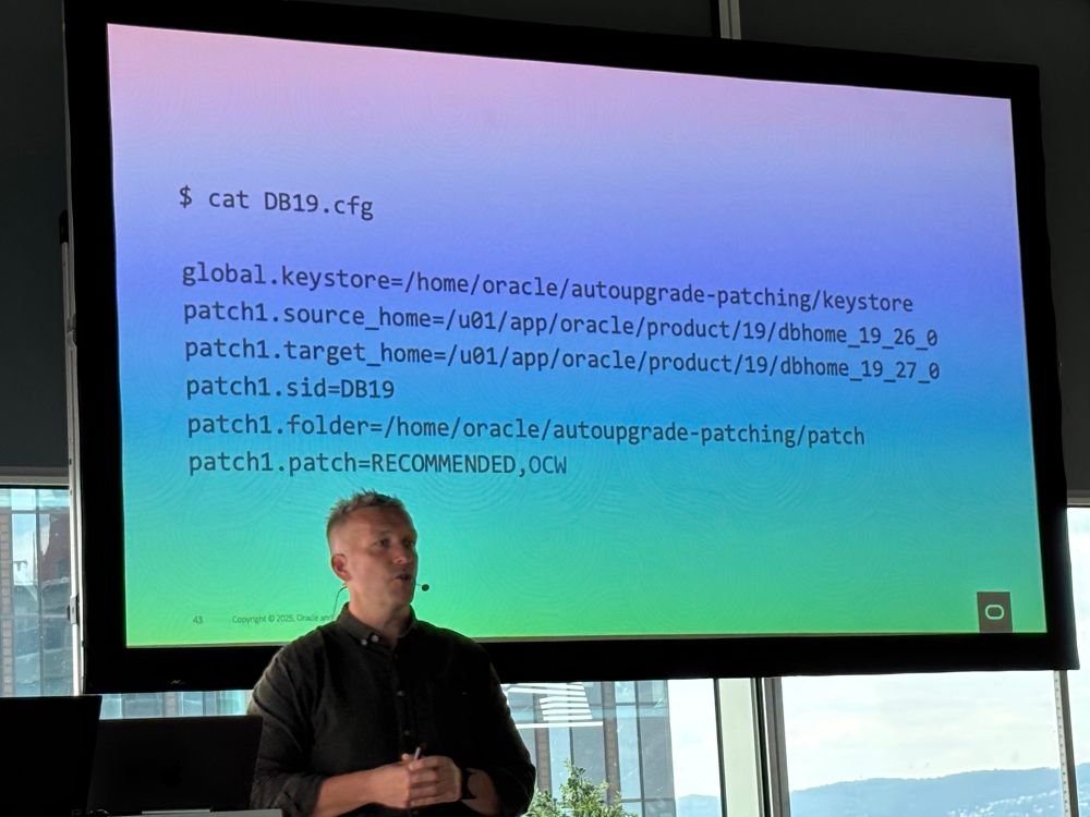 A photo showing Daniel and a config file for patching a database 