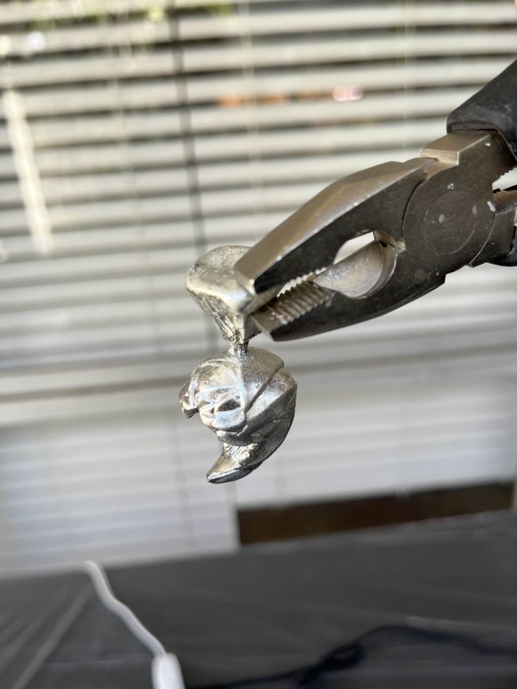 photo of a biomechanical insect creature cast in pewter 