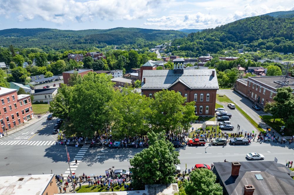 A drone photo of protestors in front of the Caledonia Courthouse in St Johnsbury, VT