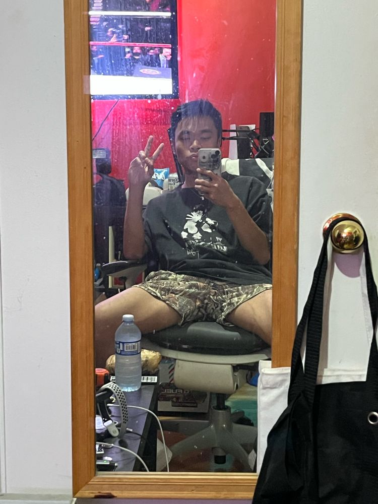 Brandon is in his besties room that gives off gaymer stoner vibes 