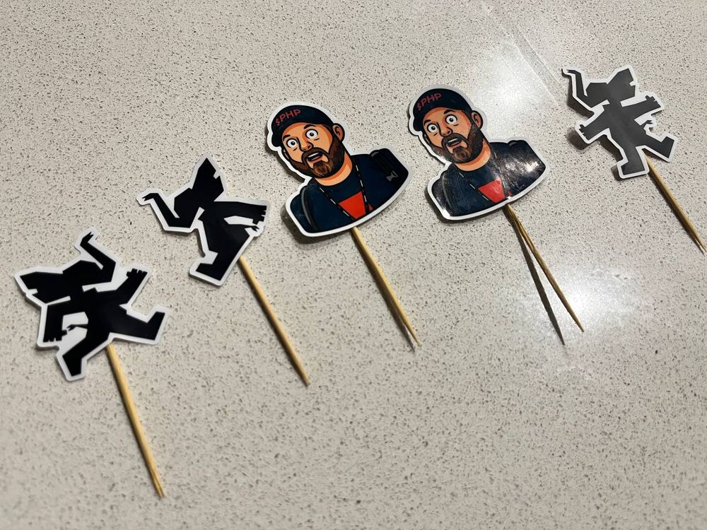 Laracon AU (and Eric Barnes) cake toppers