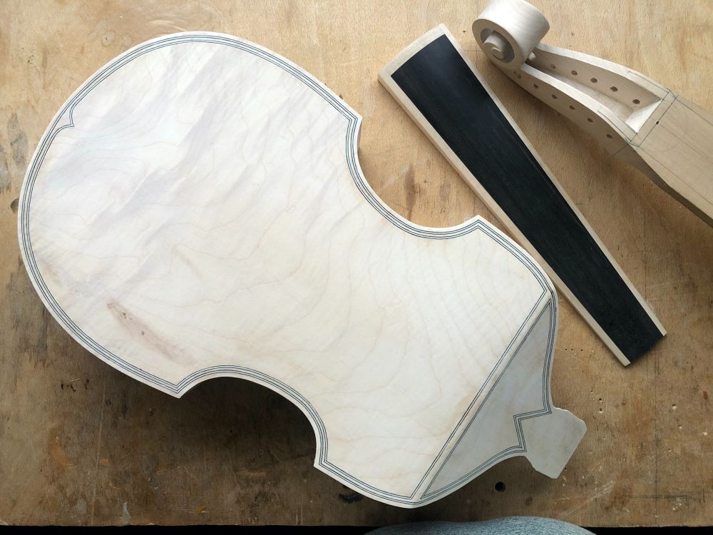 Inlaying a double perfling on a treble viol back

The completed double perfling.