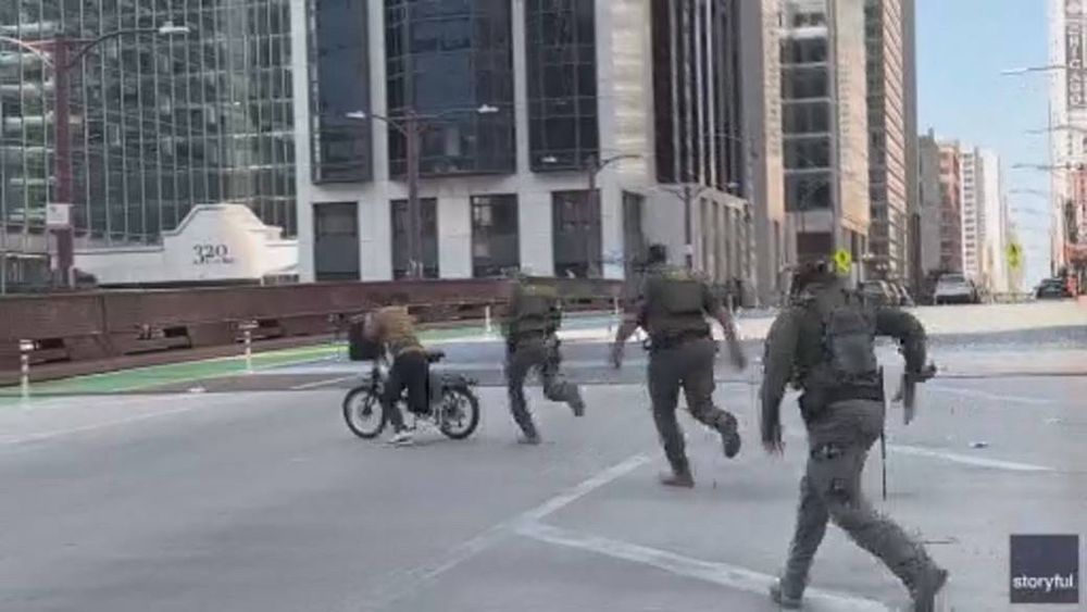 Ice goons trip and fall chasing after an e bike rider