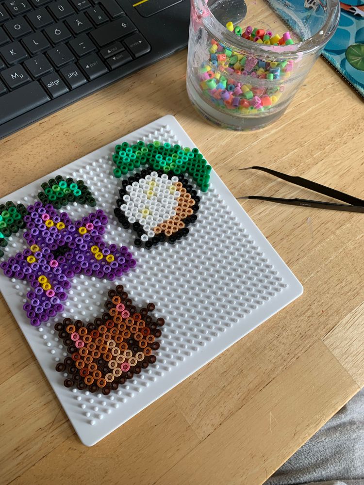 perler beads on plate unit ones, stardew valley and acnh motifs