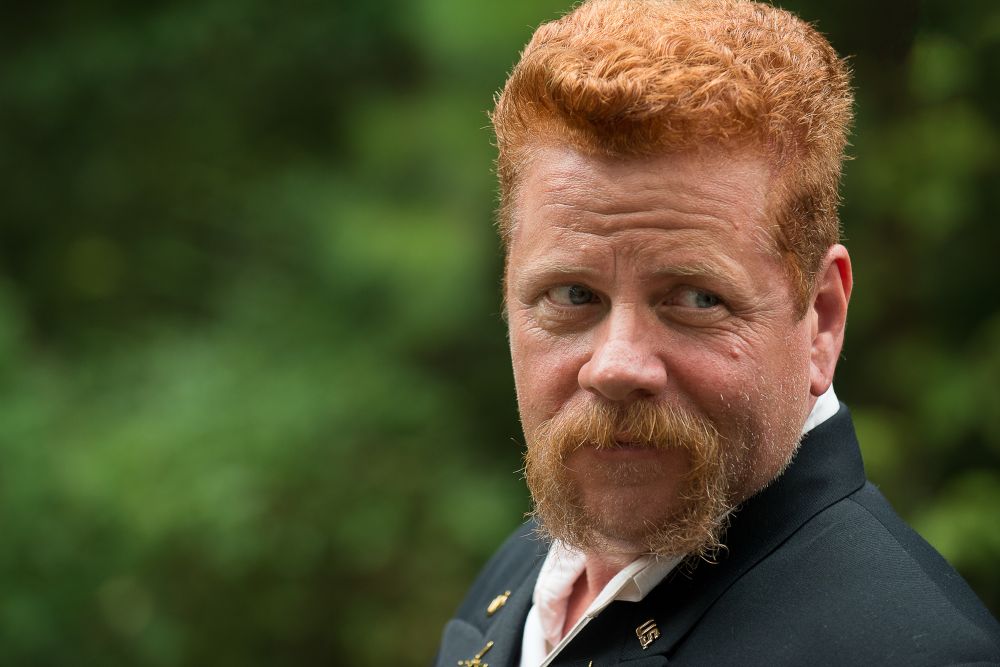 Michael Cudlitz as Abraham in The Walking Dead. Still of him in his dress blues, looking over his shoulder with a smirk. 
