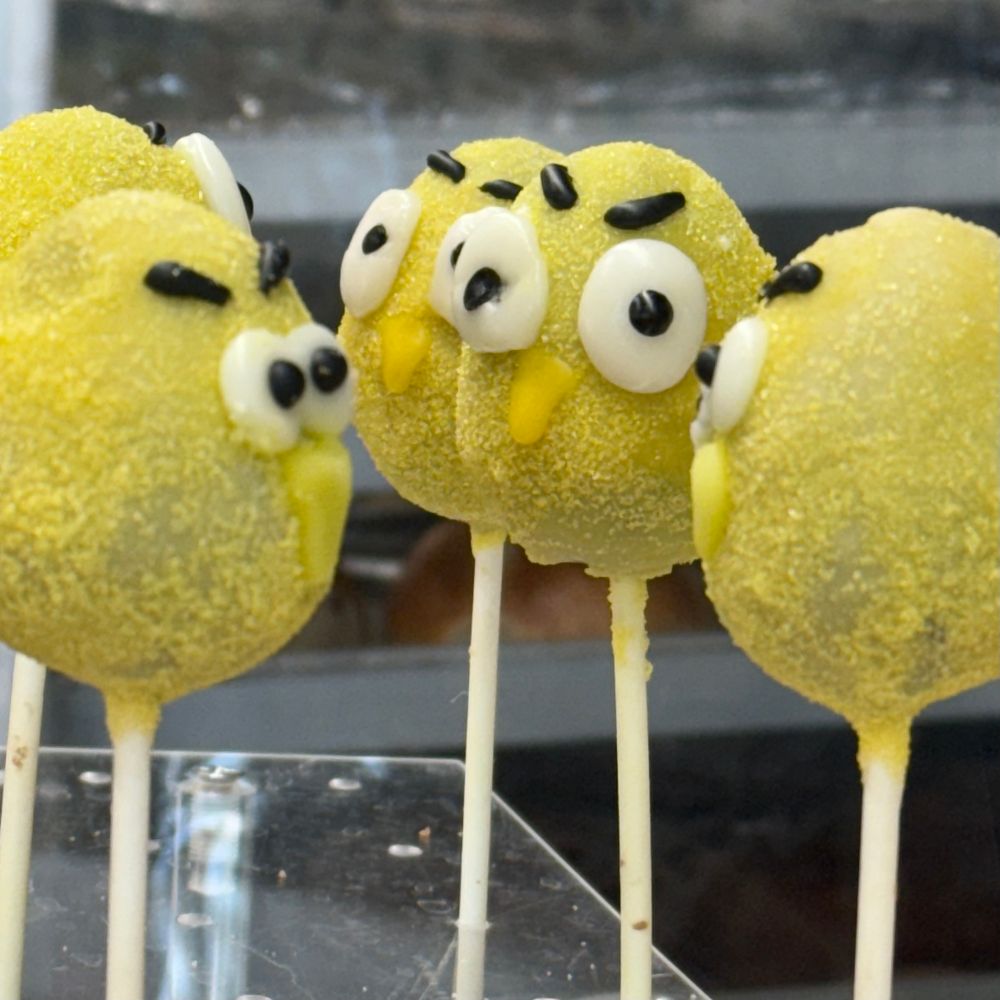 A display of angry looking chicken cake pops at a local bakery. 
