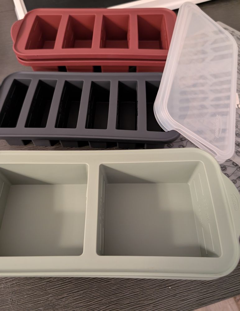 Silicone freezer trays and lids. 2 cup, 1 cup and half cup versions. 
