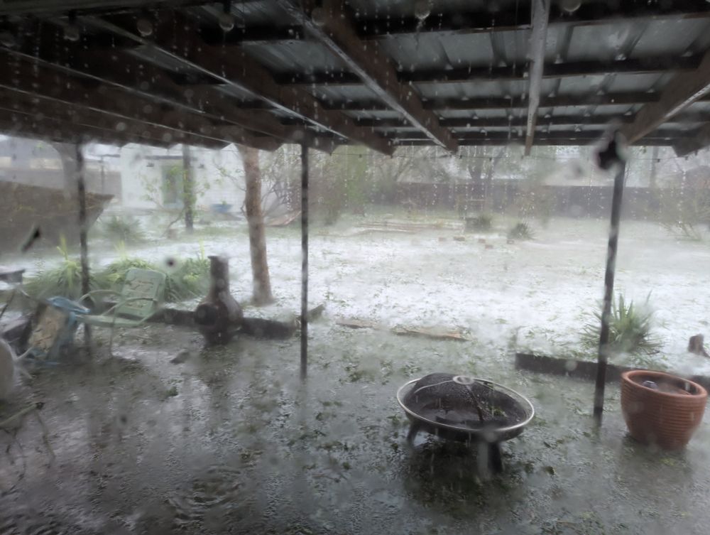 Inches of hail and a knocked down fence 