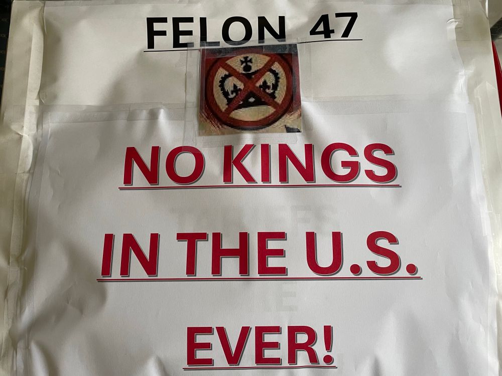 Poster side 2: Felon 47 on top of a picture of a crown with a red X going through it which is above the words No Kings in the U.S. Ever!