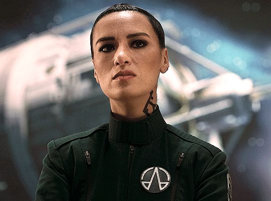 chin up, with a sneer