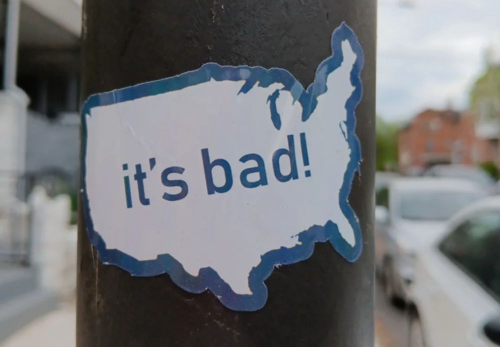 sticker on a pole that is an outline of the united states that just says “it’s bad!” 

thank you to my friend @eireannclarion.bsky.social for sharing