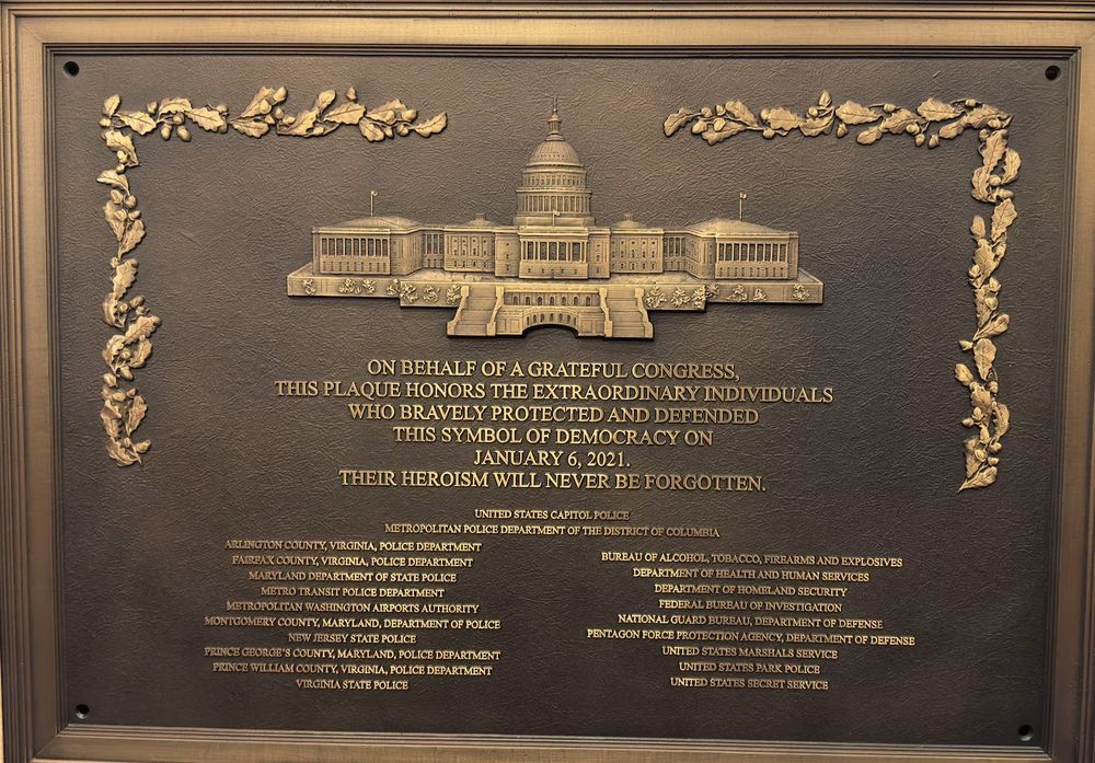 Photo of the January 6th plaque honoring law enforcement. The plaque, approved by Congress in 2022, can't be installed until House Republican leadership gives the go-ahead.