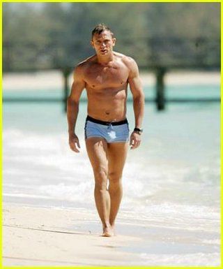 Daniel Craig as James Bond on the beach