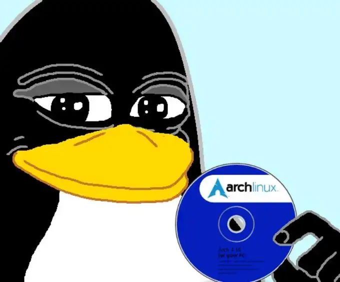 Cartoon drawing of Tux, the Linux penguin mascot, holding up a blue Arch Linux installation disc with a knowing smile.